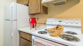 Tanglewood kitchens with electric stoves and matching appliances